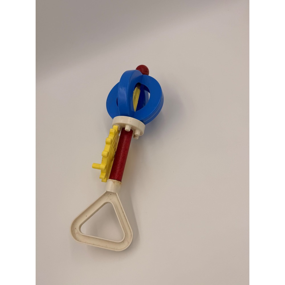 Vintage Gerber Baby Toy Rattle Spinning Gear Blue Yellow Red Primary Colors - Picture 1 of 4